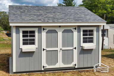 Backyard Wood shed for lawn equipment