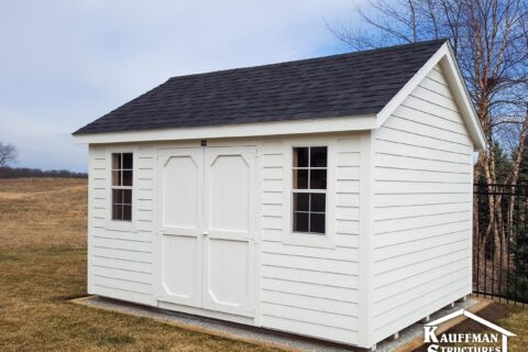 white storage shed in pella