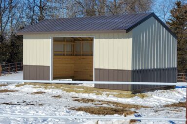 loafing shed for sale in creston ia - beige and dark taupe metal siding beneath dark taupe metal roof