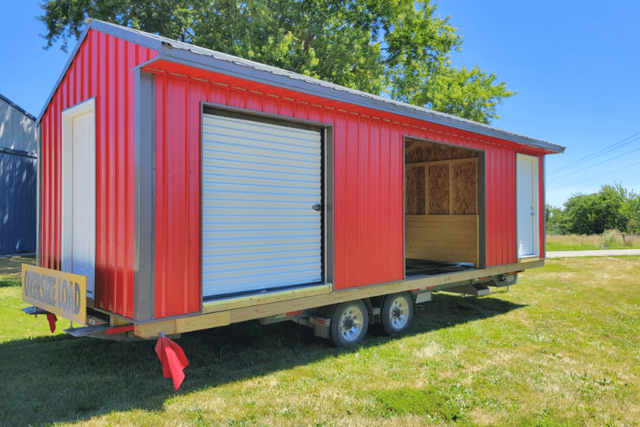res shed on shed moving trailer ready to be delivered on property