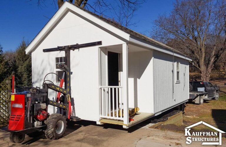 white shed getting moved