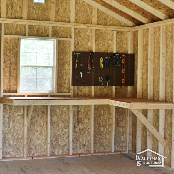 small shed with a workbench